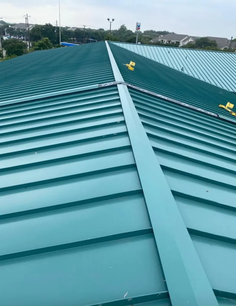 Green commercial metal roof ridge and valley for Metal Roof Repair in Greendale